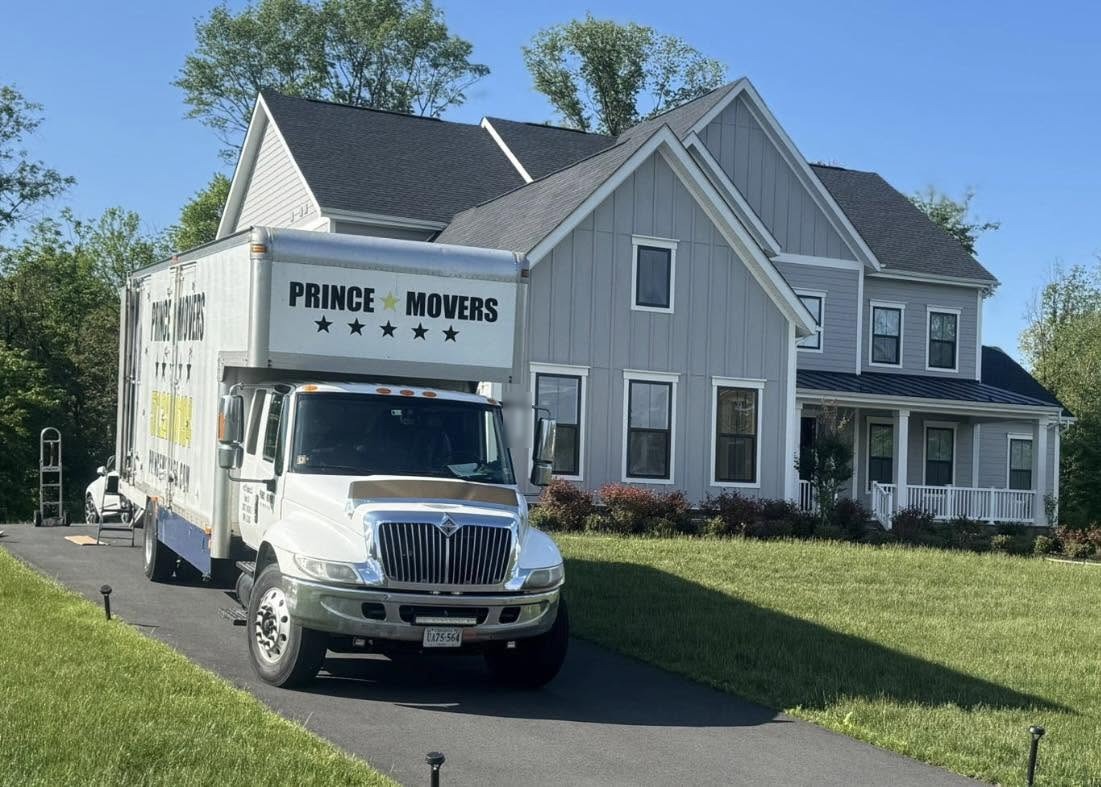 Prince Movers moving truck parked at a Northern Virginia home